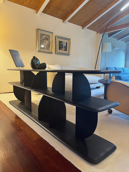 Geometric Sofa Console by Ethnicraft, showing geometric sofa console in live shot.