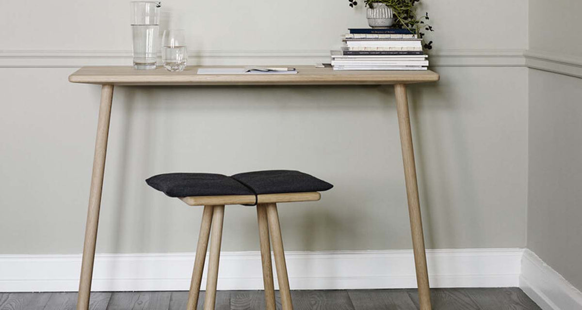 Georg Console Table by Fritz Hansen, showing georg console table in live shot.