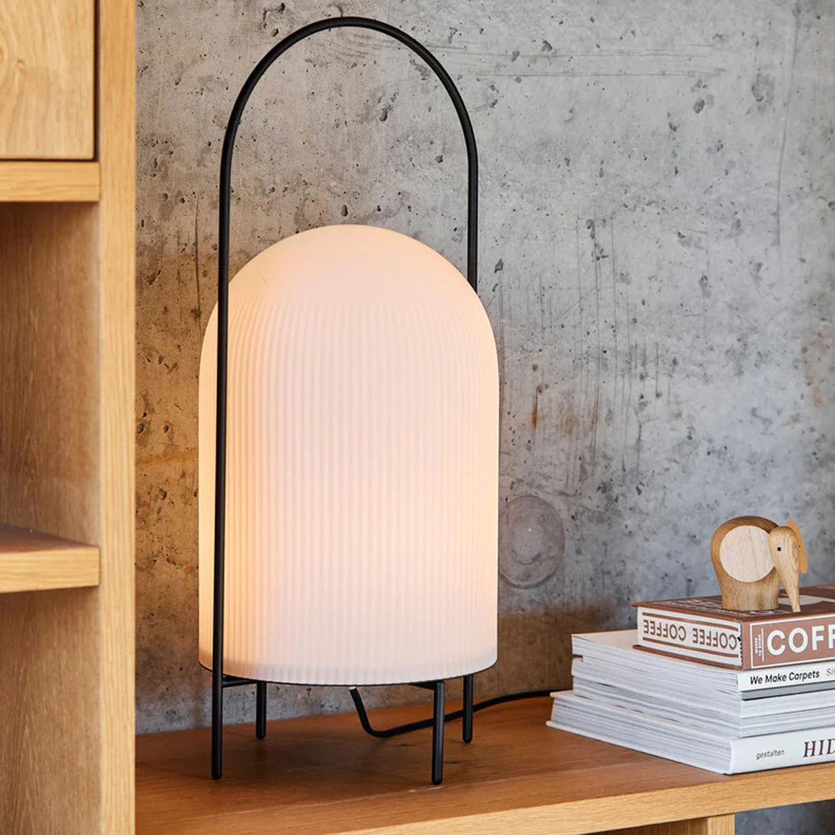 Ghost Table Lamp by Woud, showing ghost table lamp in live shot.