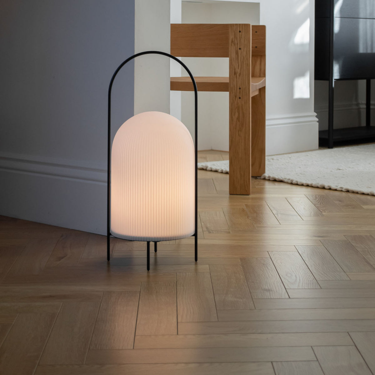 Ghost Floor Lamp by Woud, showing ghost floor lamp in live shot.