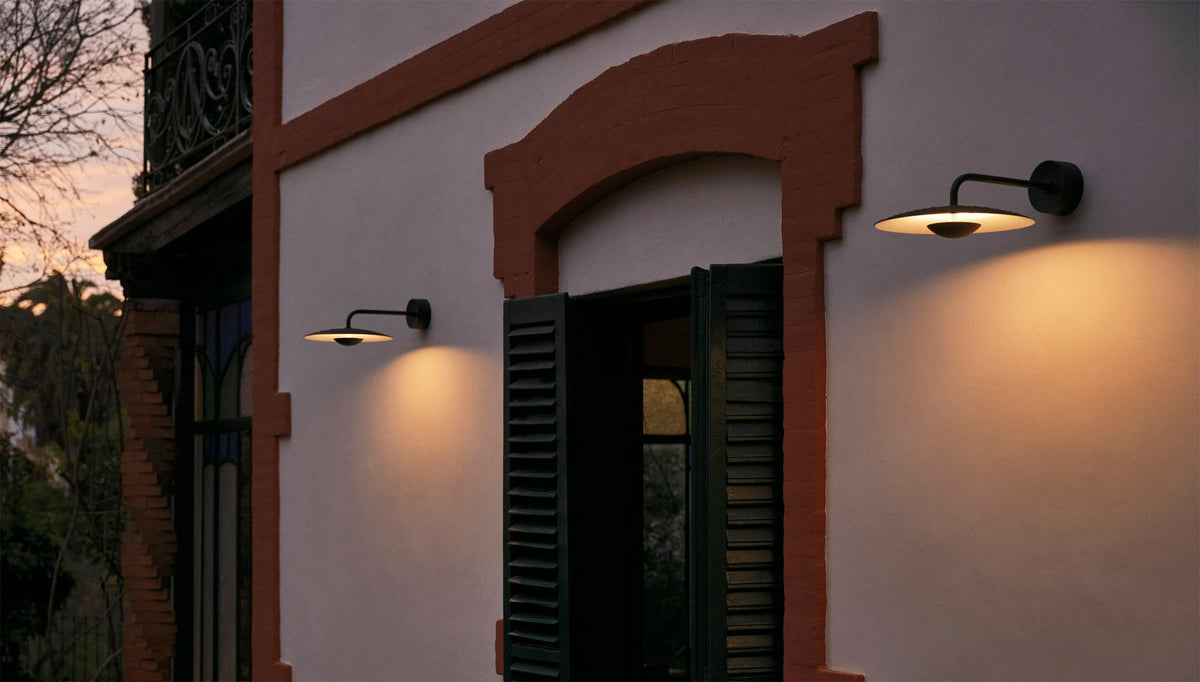 Ginger IP65 Outdoor Wall Light by Marset, showing ginger ip65 outdoor wall lights in live shot. 