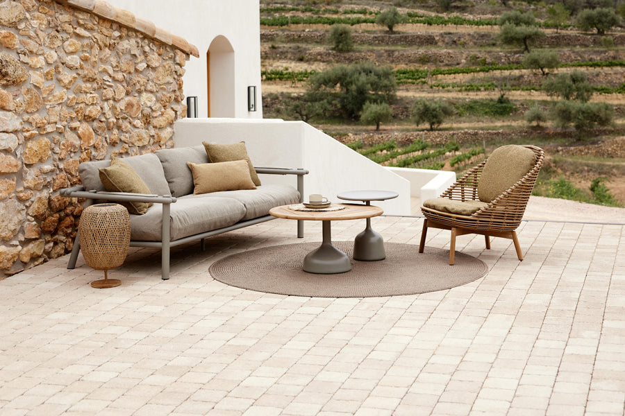 Glaze Coffee Table by Cane-Line, showing glaze coffee tables in live shot.