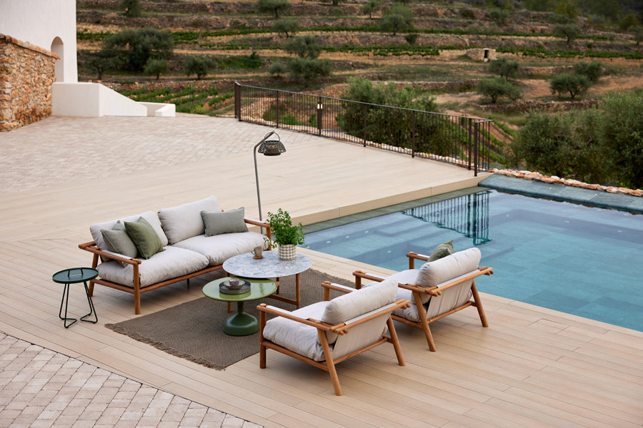 Glaze Coffee Table by Cane-Line, showing glaze coffee tables in live shot.