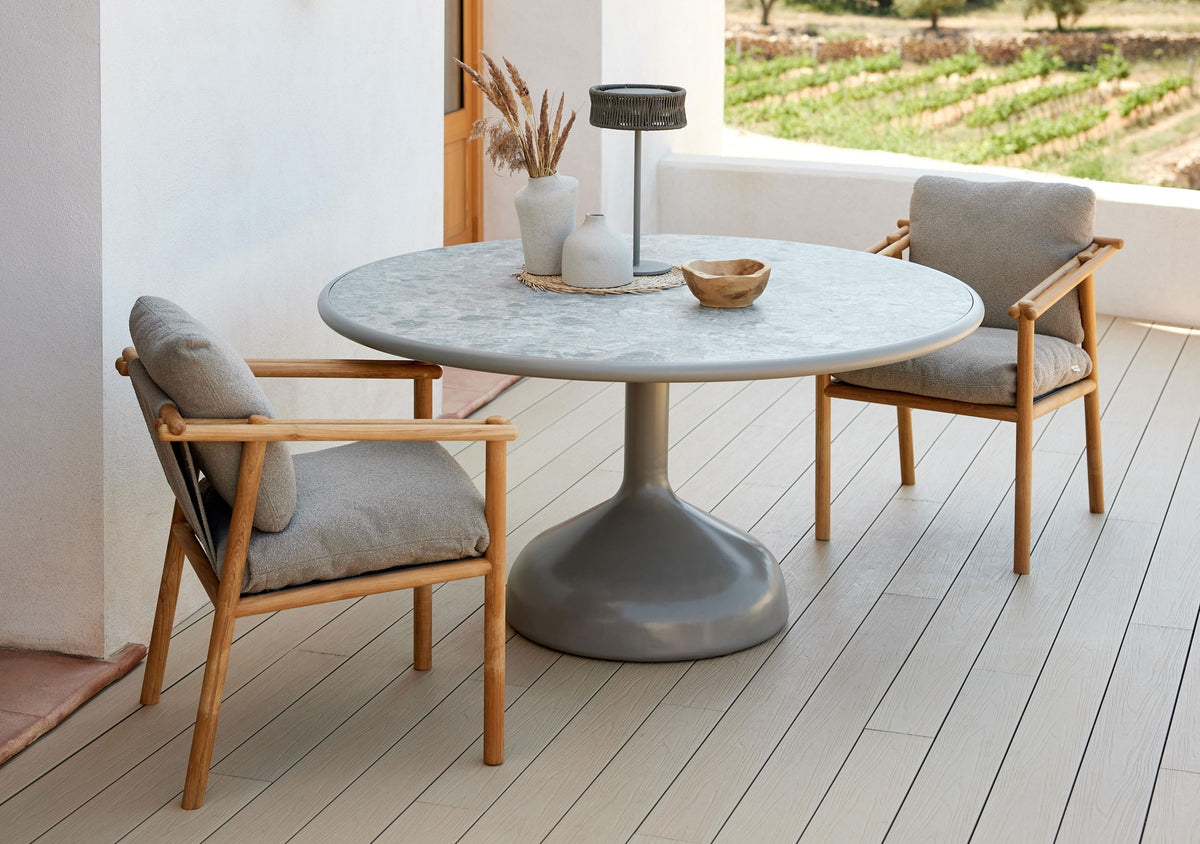 Glaze Dining Table by Cane-Line, showing glaze dining table in live shot.