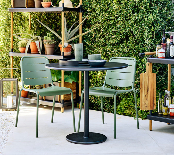 Go 24" Cafe Table by Cane-Line, showing go 24" cafe table in live shot.