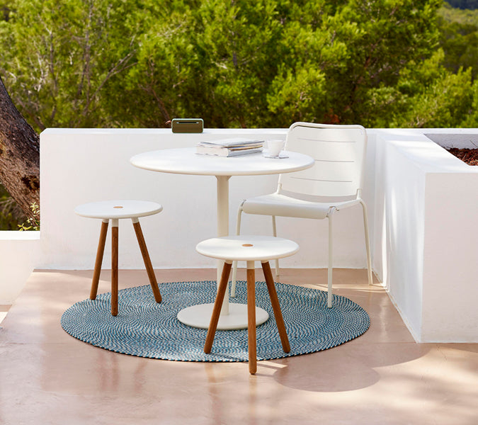 Go 24" Cafe Table by Cane-Line, showing go 24" cafe table in live shot.