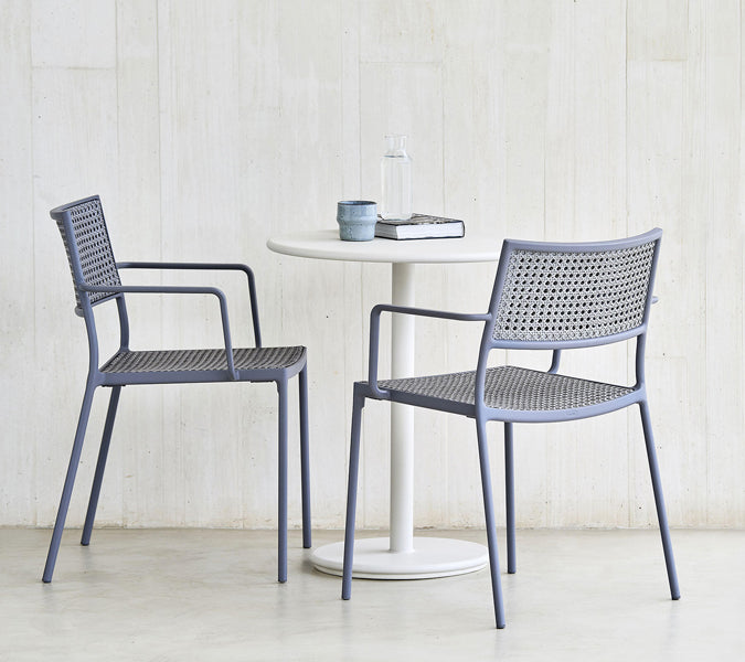 Go 24" Cafe Table by Cane-Line, showing go 24" cafe table in live shot.