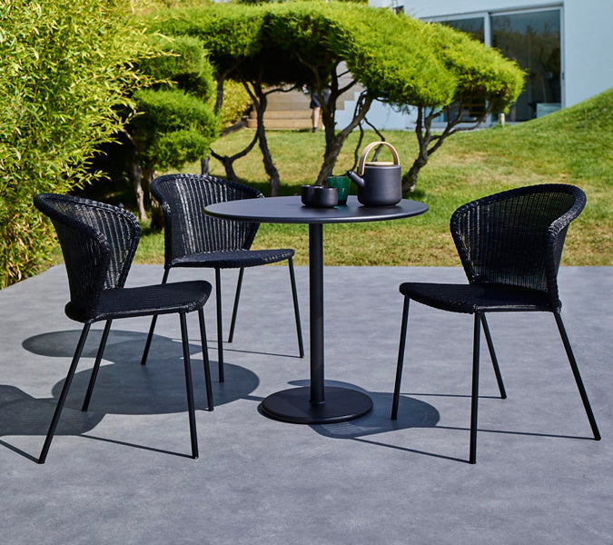 Go 32" Cafe Table by Cane-Line, showing go 32" cafe table in live shot.