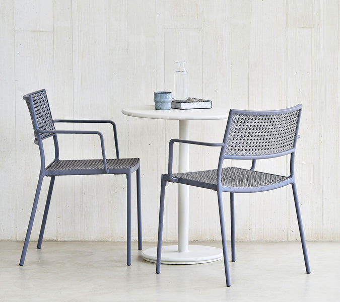 Go 32" Cafe Table by Cane-Line, showing go 32" cafe table in live shot.