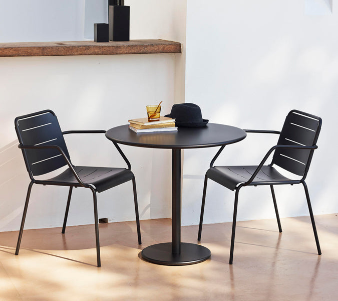 Go 32" Cafe Table by Cane-Line, showing go 32" cafe table in live shot.