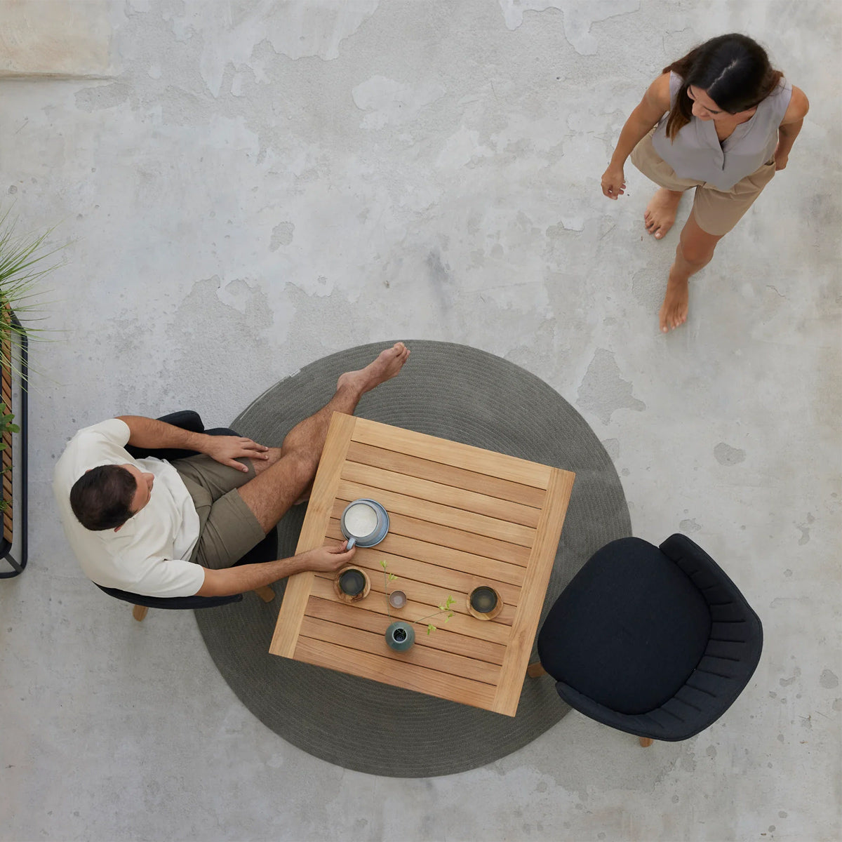 Go Square 28.4" Cafe Table by Cane-Line, showing go square 28.4" cafe table in live shot.