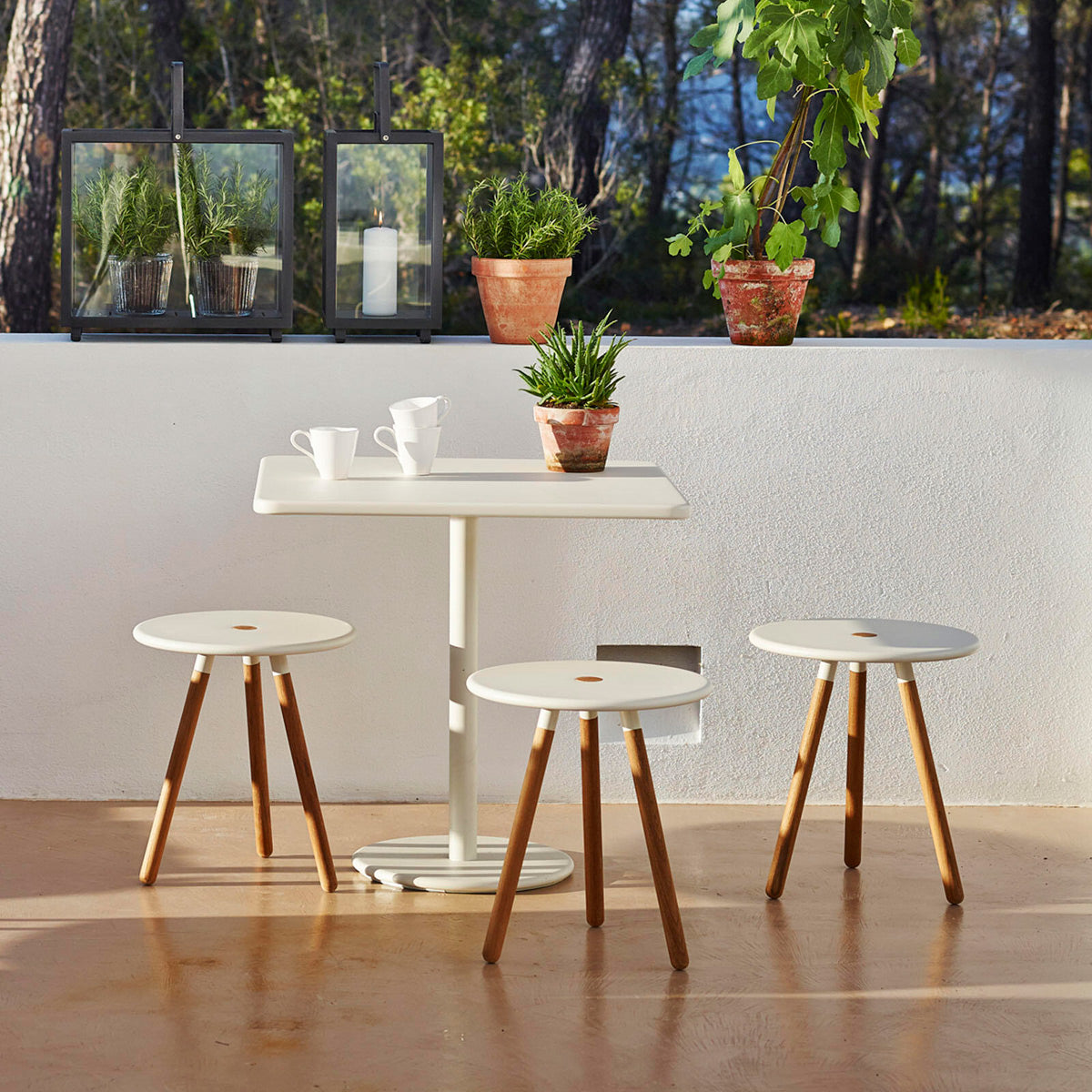 Go Square 30" Cafe Table by Cane-Line, showing go square 30" cafe table in live shot.