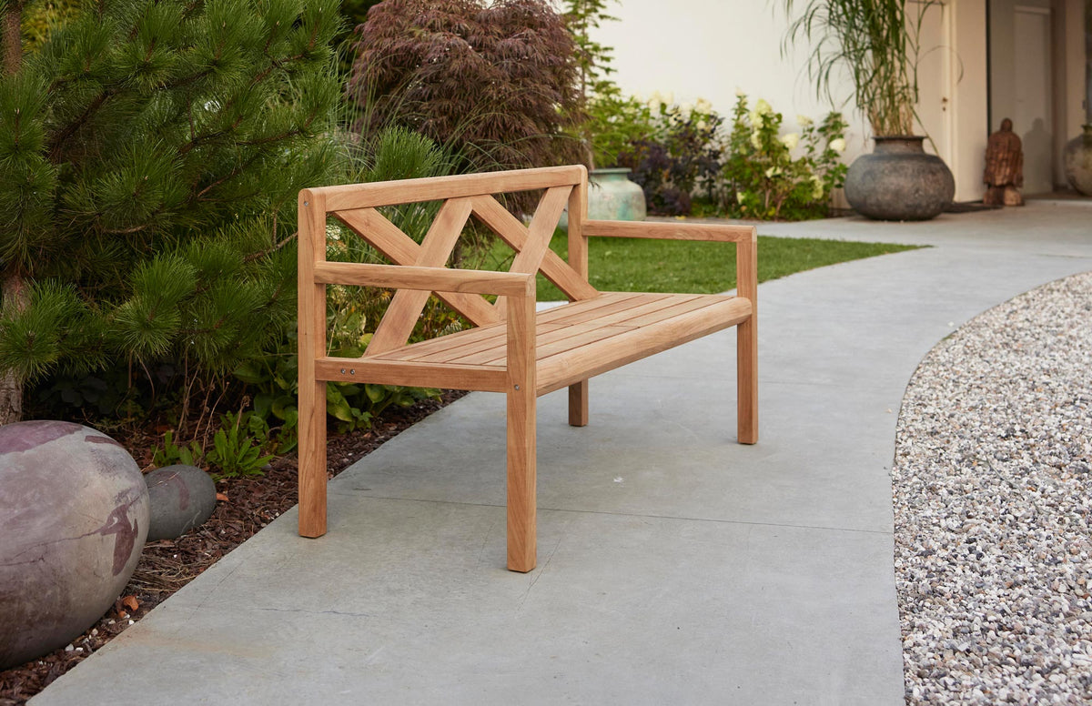 Grace Bench by Cane-Line, showing grace bench in live shot.