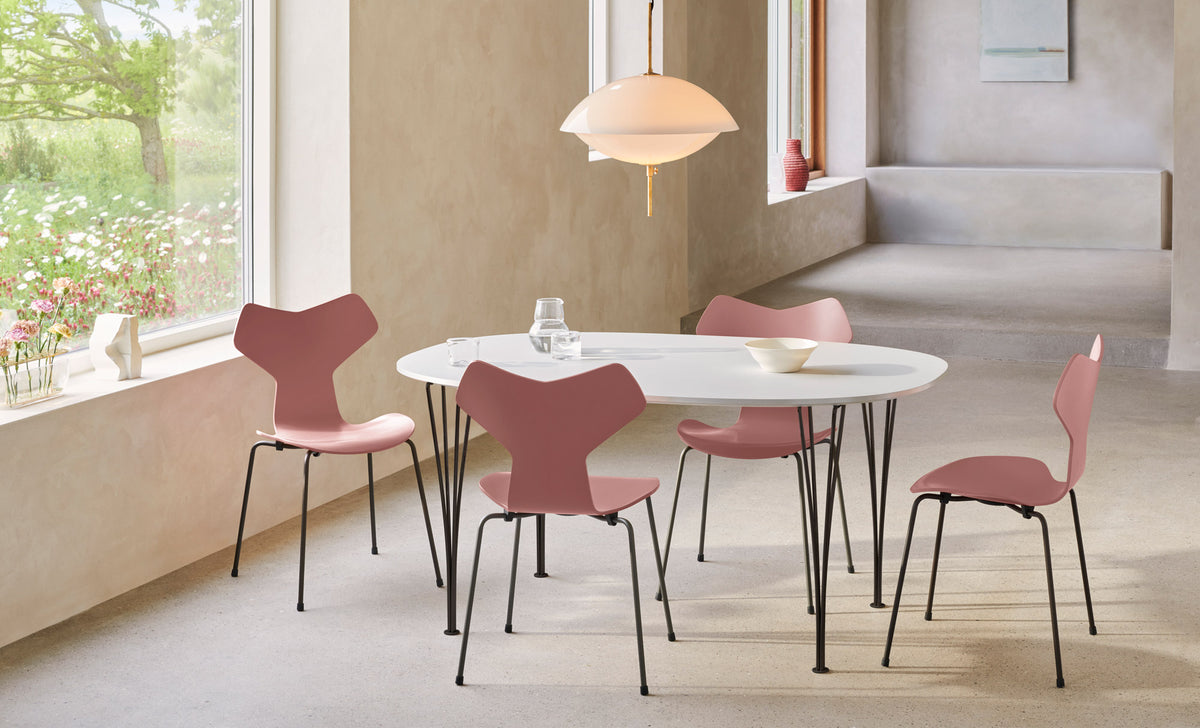 Grand Prix Chair by Fritz Hansen, showing grand prix chairs in live shot.