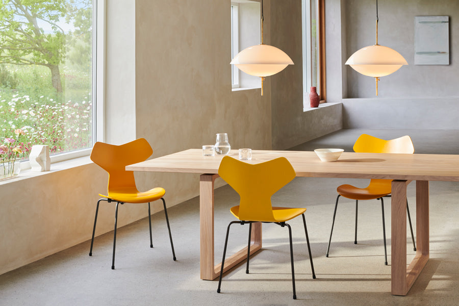 Grand Prix Chair by Fritz Hansen, showing grand prix chairs in live shot.