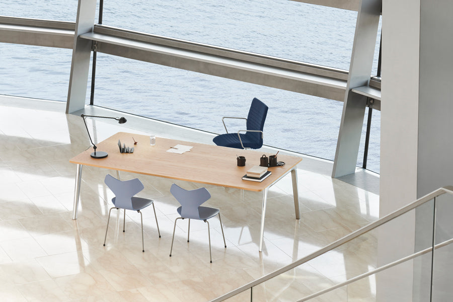 Grand Prix Chair by Fritz Hansen, showing grand prix chairs in live shot.