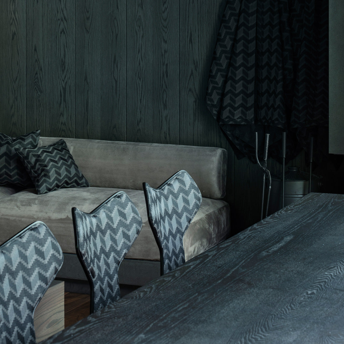 Grand Prix Front Upholstery Wooden Legs Chair by Fritz Hansen, showing closeup view of grand prix front upholstery wooden legs chairs in live shot.