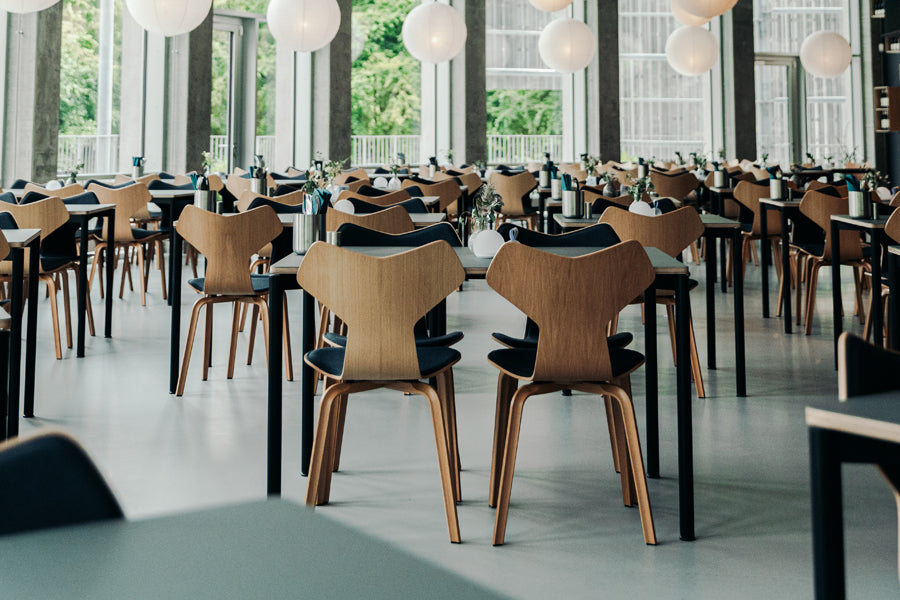 Grand Prix Front Upholstery Wooden Legs Chair by Fritz Hansen, showing grand prix front upholstery wooden legs chairs in live shot.