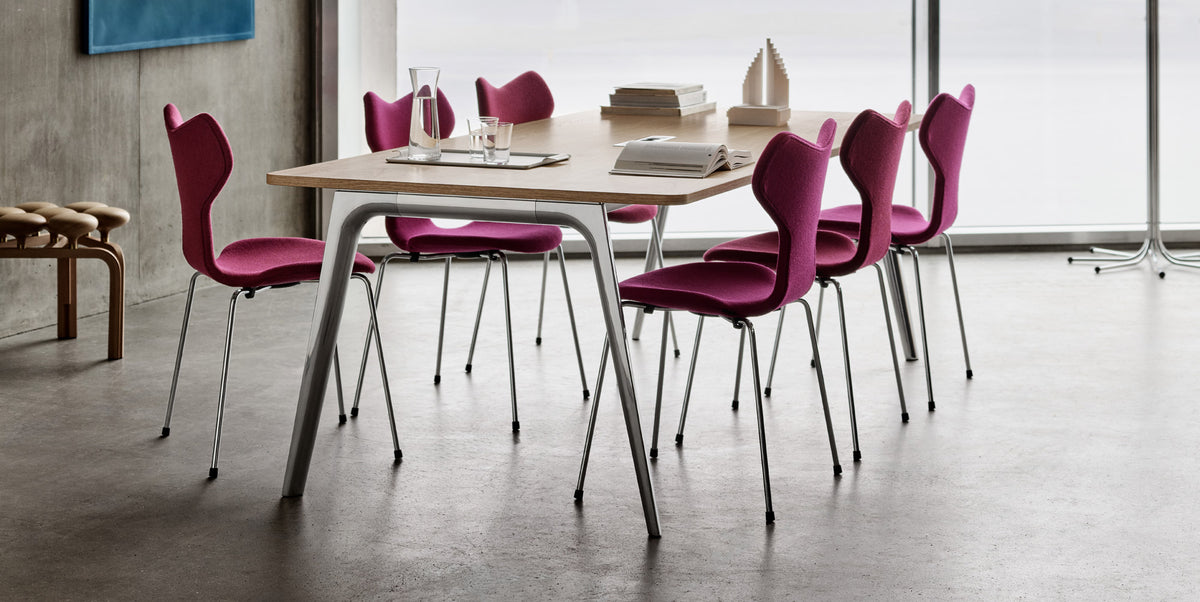 Grand Prix Full Upholstery Chair by Fritz Hansen, showing grand prix full upholstery chairs in live shot.