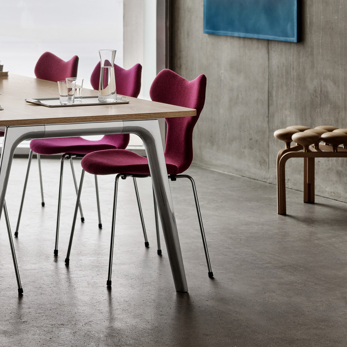 Grand Prix Full Upholstery Chair by Fritz Hansen, showing grand prix full upholstery chairs in live shot.