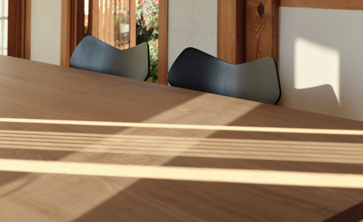 Grand Prix Swivel Chair by Fritz Hansen, showing closeup view of grand prix swivel chair in live shot.