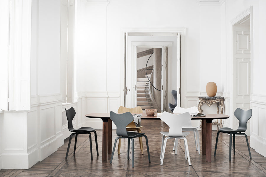 Grand Prix Wooden Legs Chair by Fritz Hansen, showing grand prix wooden legs chairs in live shot.