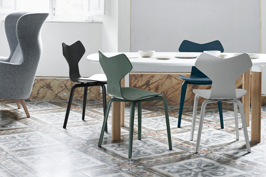 Grand Prix Wooden Legs Chair by Fritz Hansen, showing grand prix wooden legs chairs in live shot.