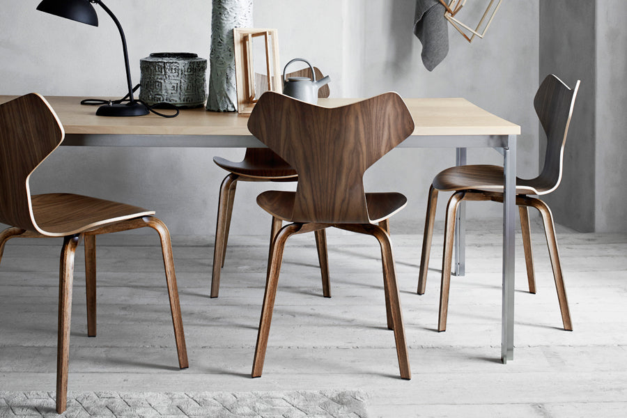 Grand Prix Wooden Legs Chair by Fritz Hansen, showing grand prix wooden legs chairs in live shot.