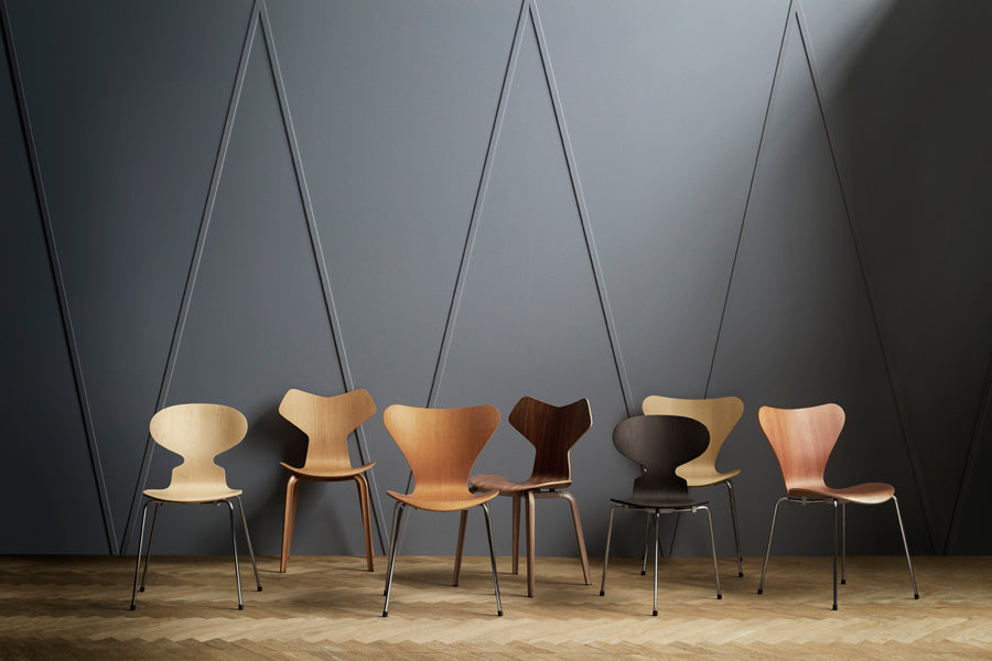 Grand Prix Wooden Legs Chair by Fritz Hansen, showing grand prix wooden legs chairs in live shot.