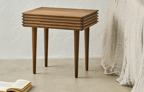 Groove Night Table With Legs by DK3, showing groove night table with legs in live shot.