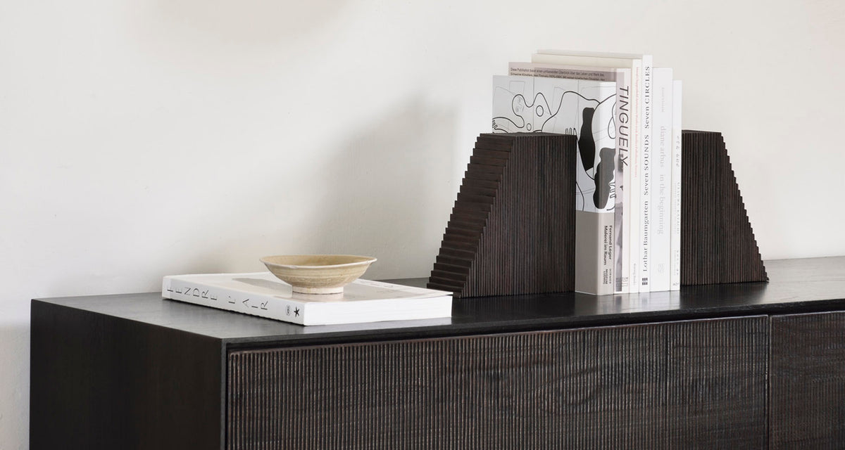 Grooves Book Ends by Ethnicraft, showing grooves book ends in live shot.