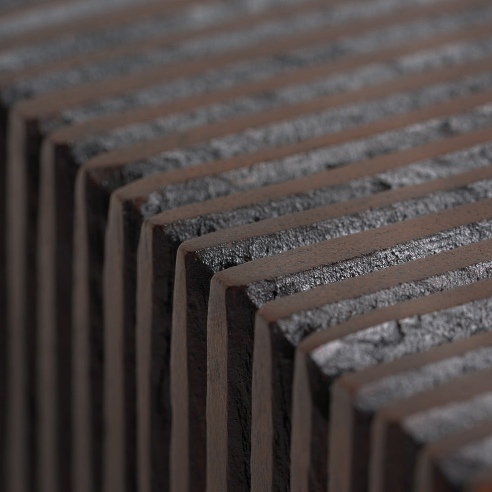 Grooves Book Ends by Ethnicraft, showing closeup view of grooves book ends.