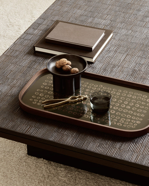Grooves Coffee Table by Ethnicraft, showing closeup view of grooves coffee table in live shot.