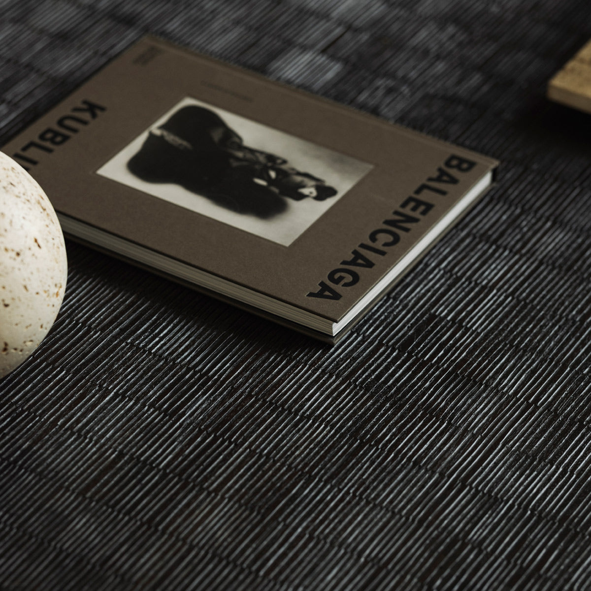 Grooves Coffee Table by Ethnicraft, showing closeup view of grooves coffee table in live shot.