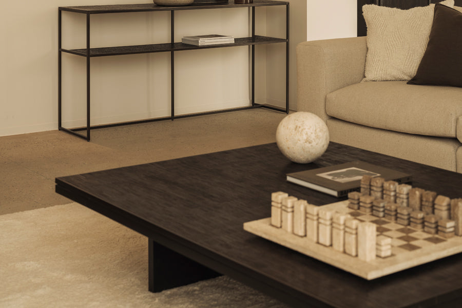 Grooves Coffee Table by Ethnicraft, showing closeup view of grooves coffee table in live shot.
