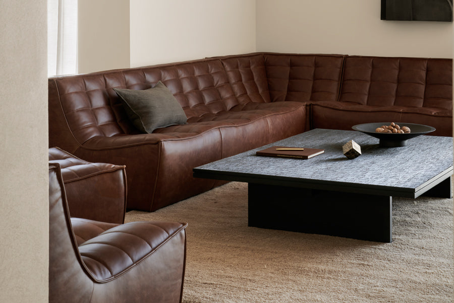Grooves Coffee Table by Ethnicraft, showing closeup view of grooves coffee table in live shot.