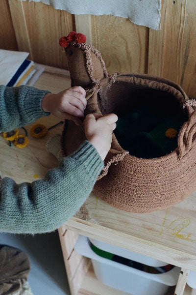 Growing up Basket  by Lorena Canals, showing growing up basket  in live shot.