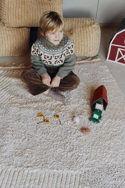 Growing up Washable Rug  by Lorena Canals, showing growing up washable rug in live shot.