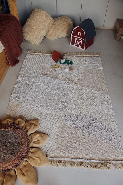 Growing up Washable Rug  by Lorena Canals, showing growing up washable rug in live shot.