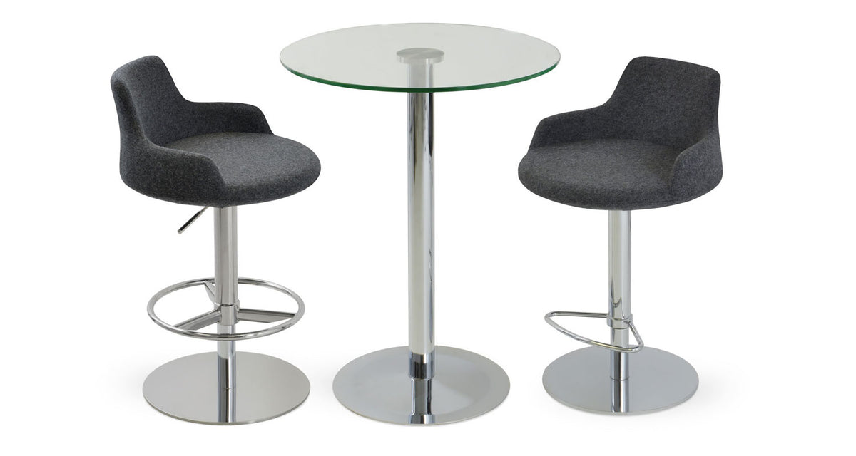 Dervish Piston Stool Half Footrest by SohoConcept, showing piston stool with table.