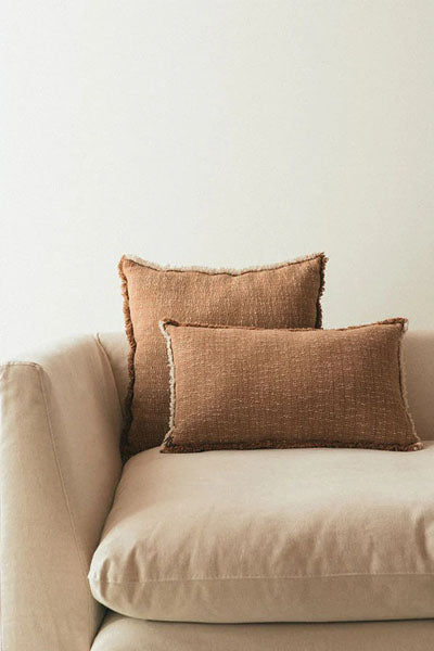 Handloom Cushion by Lorena Canals, showing handloom cushion in live shot.