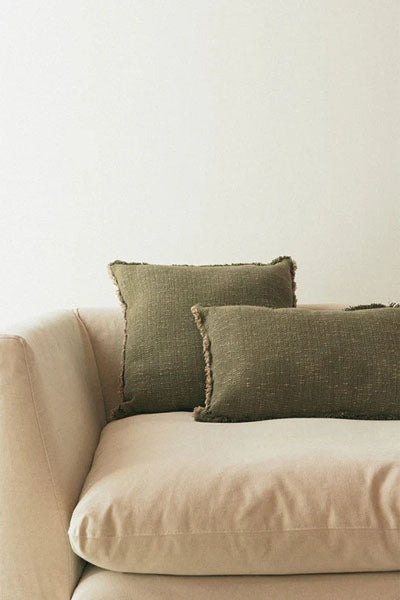 Handloom Cushion by Lorena Canals, showing handloom cushion in live shot.