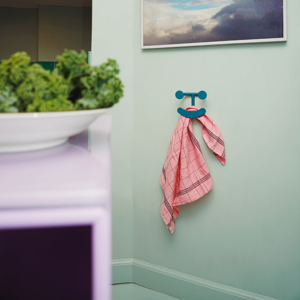 Happy Hook by Fritz Hansen, showing happy hook in live shot.