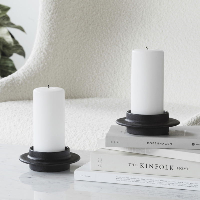 Heima Candle Holder by Normann Copenhagen, showing heima candle holder in live shot.