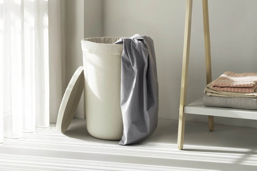 Hide Laundry Basket by Normann Copenhagen, showing hide laundry basket in live shot.