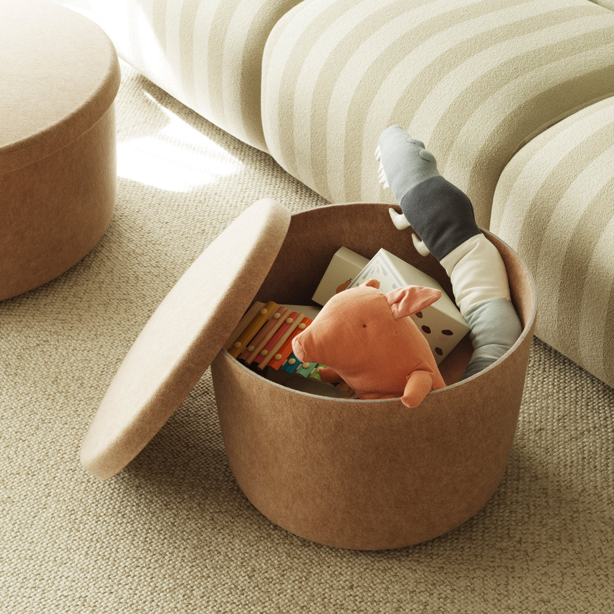 Hide Storage Pouf by Normann Copenhagen, showing hide storage poufs in live shot.
