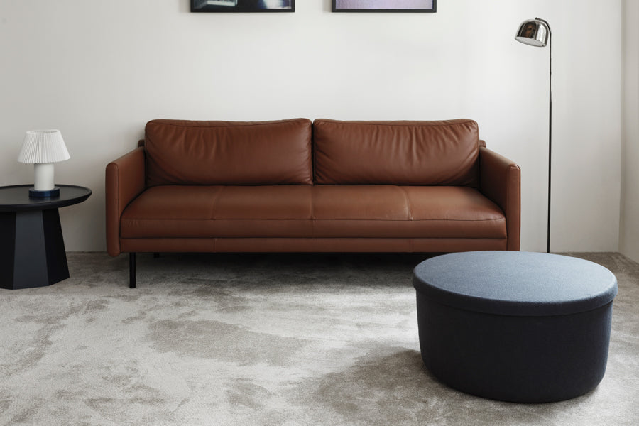 Hide Storage Pouf by Normann Copenhagen, showing hide storage pouf in live shot.