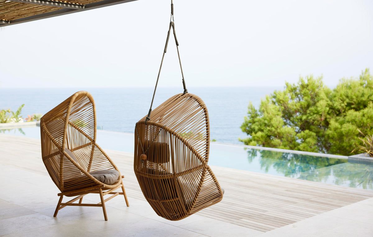Hive Hanging Chair with Rope by Cane-Line, showing hive hanging chair with rope in live shot.