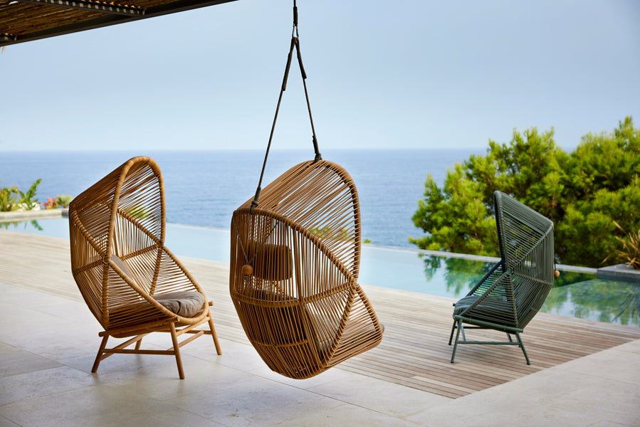 Hive Hanging Chair with Rope by Cane-Line, showing hive hanging chair with rope in live shot.