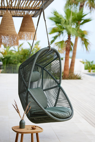 Hive Hanging Chair with Rope by Cane-Line, showing hive hanging chair with rope in live shot.